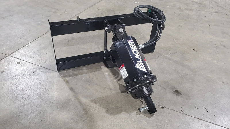 Load image into Gallery viewer, Heavy-duty hydraulic auger attachment for skid steer on concrete floor
